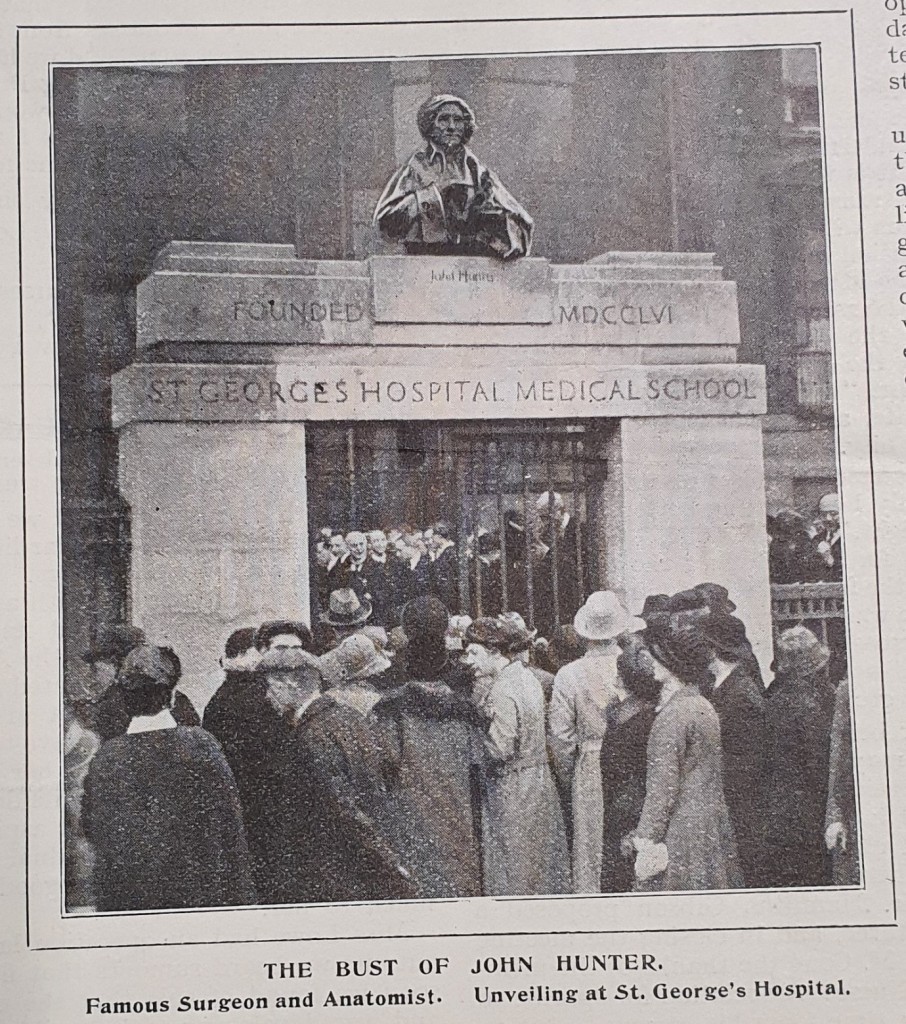 Photo of a newspaper clipping showing a photo of people attending the unveiling of the bust of John Hunter at the St George's Hospital Medical School, Hyde Park Corner. Not Dated.