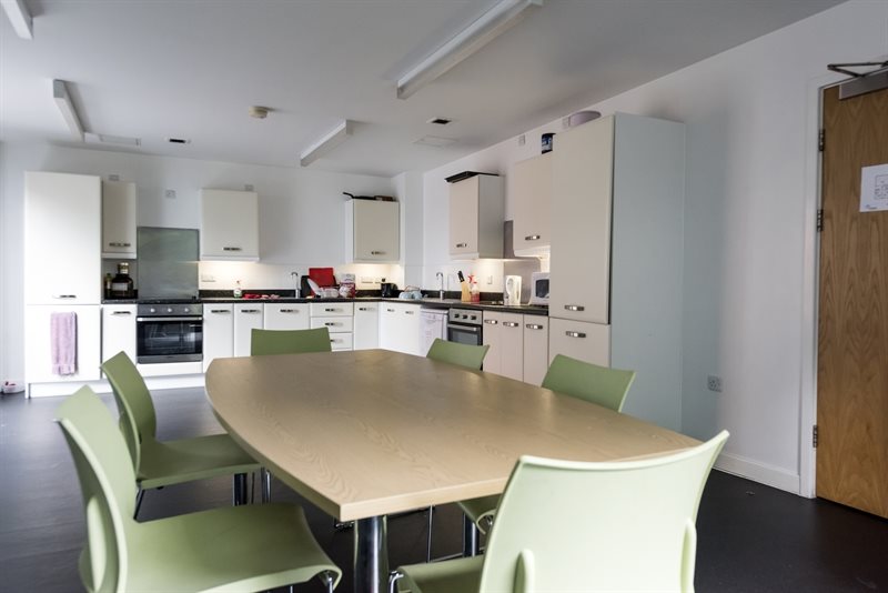 A common area and kitchen in Horton Halls.