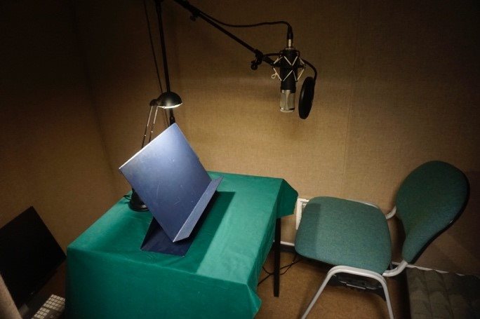 A photo of the sound recording booth in the television studio.