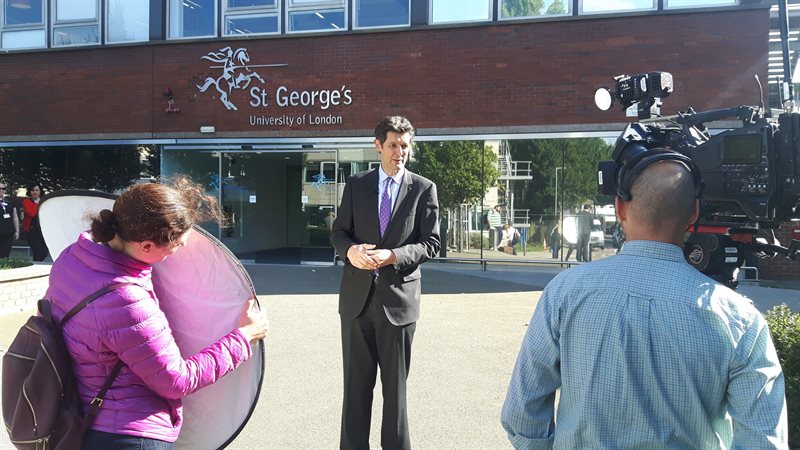 BBC's Hugh Pym filming in front of St George's.