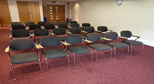 Chairs laid out in theatre style.