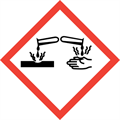 The corrosive chemical hazard symbol.