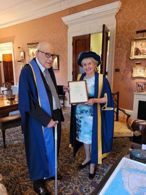 A photo of Sir Joseph Hotung with Principal Professor Jenny Higham