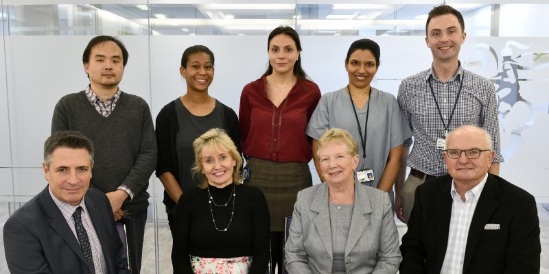 Visit in December 2019 by donors James and Margaret Lancaster to meet Professor Elijah Behr and his research group. Back row L-R: Dr Xinkai Wang, Sabrina Smith, Dr Chiara Scrocco, Dr Yanushi Wijeyeratne, Dr Chris Miles. Front row: L-R: Prof Elijah Behr, Prof Jenny Higham, Margaret Lancaster, James Lancaster.