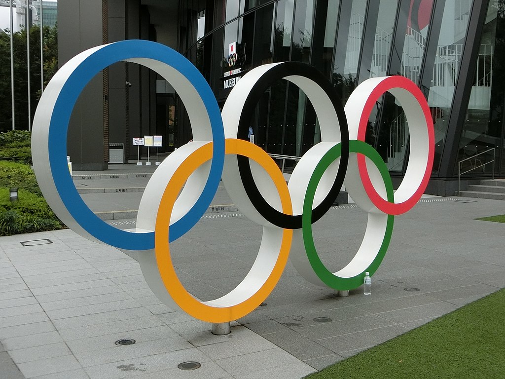 The Olympic Rings monument, in front of Japan Olympic Museum by RuinDig. https://commons.wikimedia.org/wiki/File:The_Olympic_Rings_in_Tokyo_02.jpg