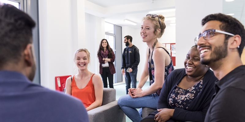 Students chatting in the halls.