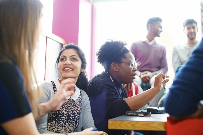 A group of students chatting.